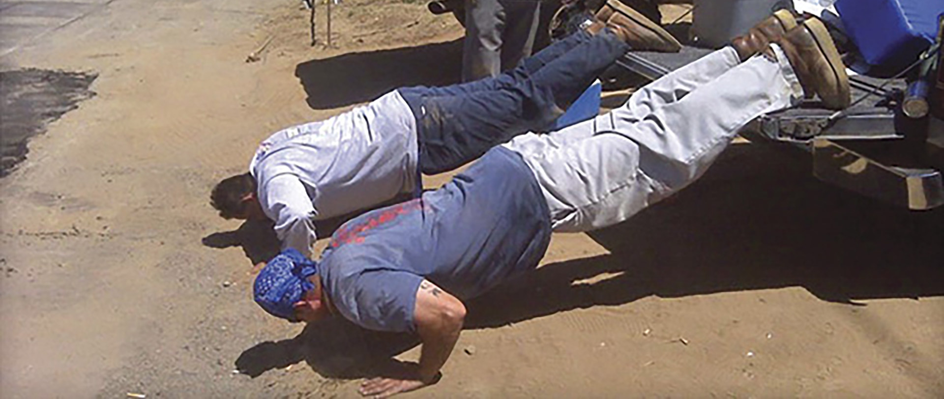 construction workers doing push ups