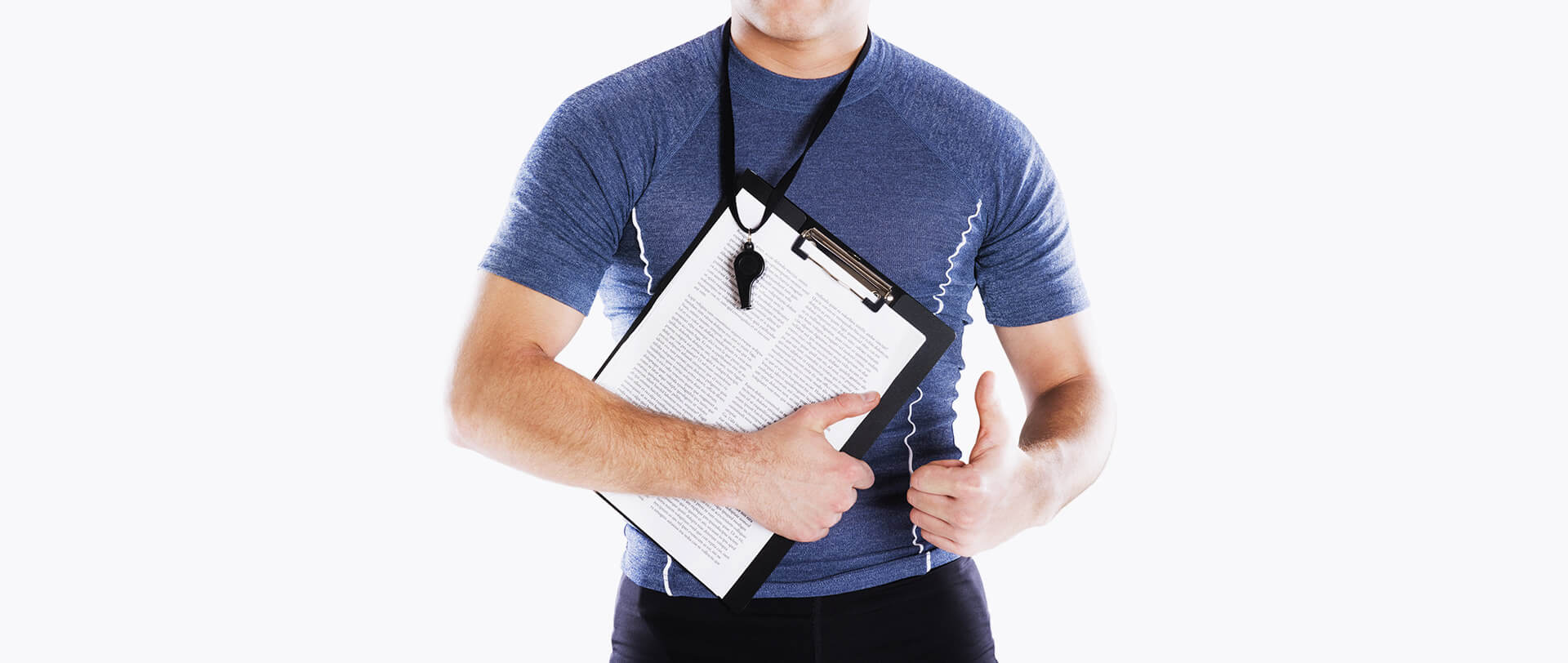A health coach holds a clipboard and flashes an encouraging thumbs-up. But are these really what’s needed for effective health coaching?