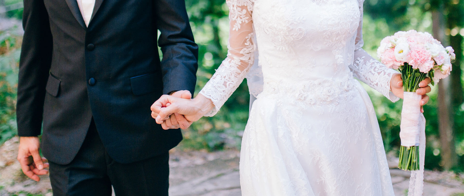 Married couple with interlocked arms